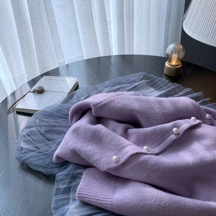 Cardigan femme avec élégants boutons en perles et design moderne Chic & Stil