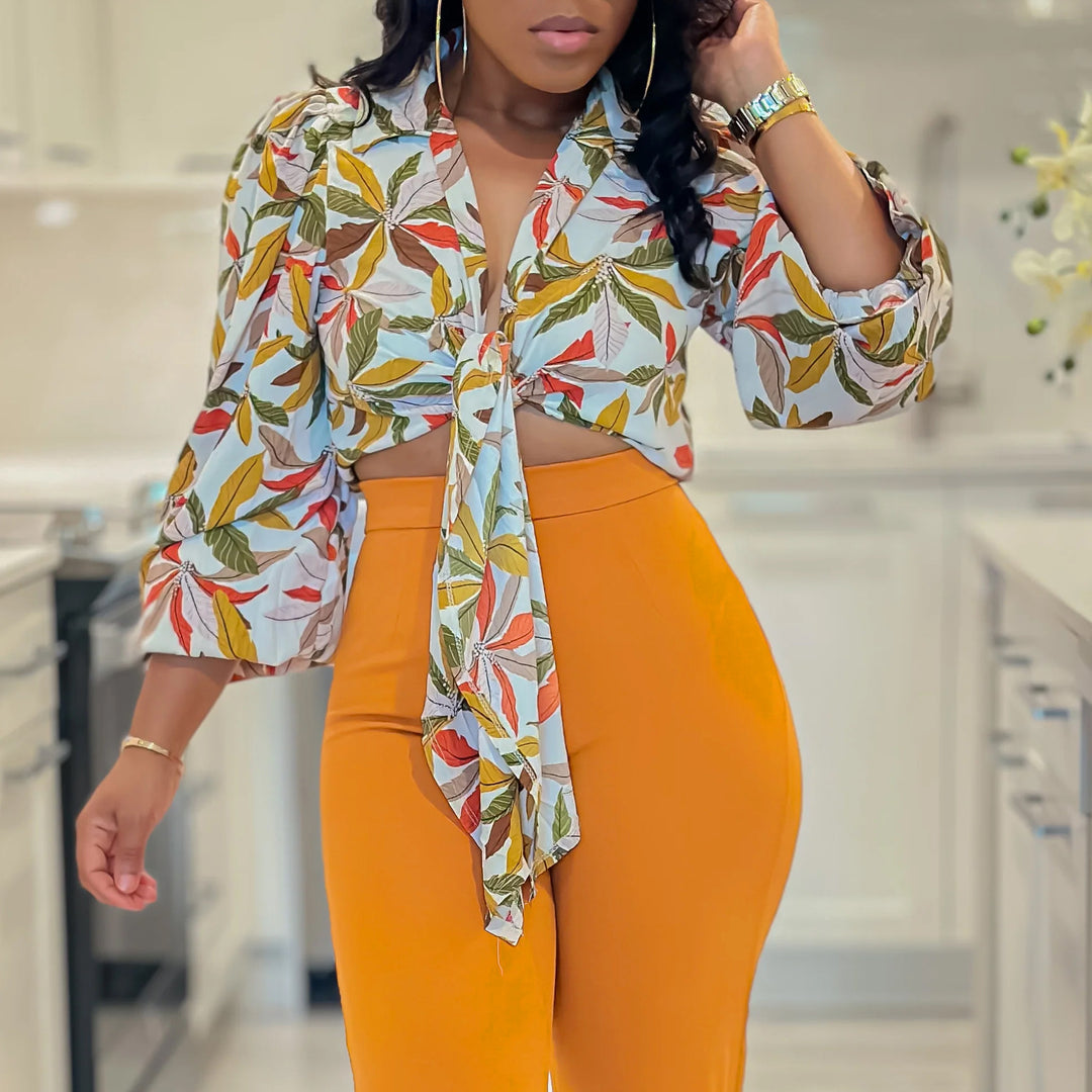 Ladies Trendy Cropped Blouse with floral design and bow detail Lune London