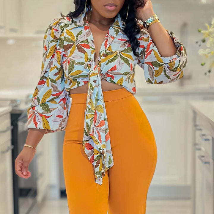 Ladies Trendy Cropped Blouse with floral design and bow detail Lune London