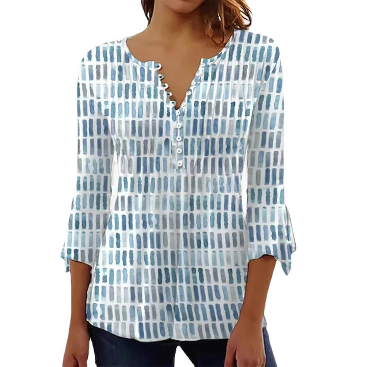 Blouse pour femmes au design graphique moderne avec détails de boutons Chic & Stil