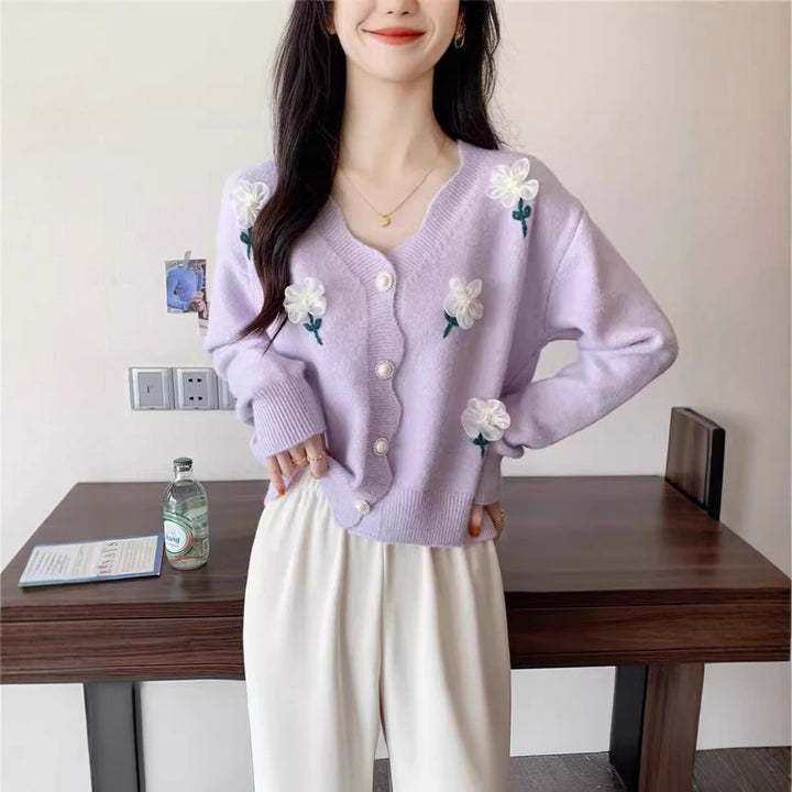 Sweater jacket for women with a floral design and elegant pearl buttons Lune London