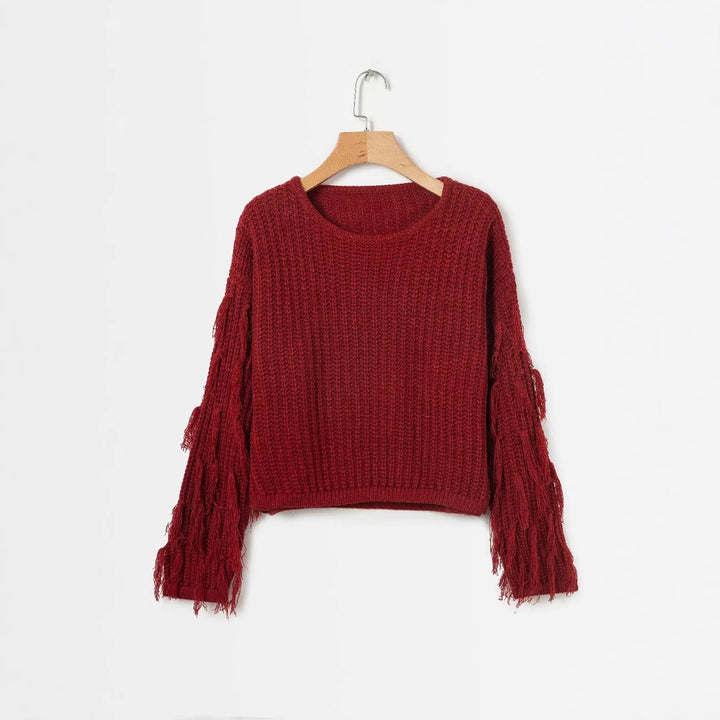 Trendy knitted pullover for women with fringed sleeves and a unique textured pattern Lune London