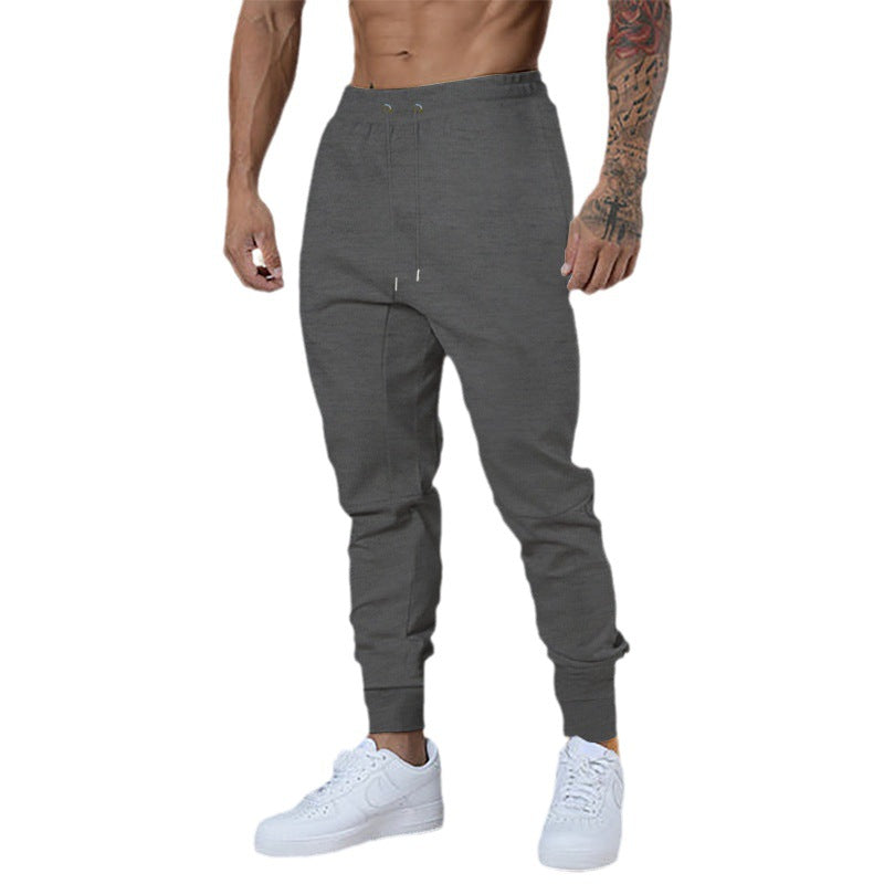 Men's sporty jogger pants with elastic waistband and practical zip pockets Lune London