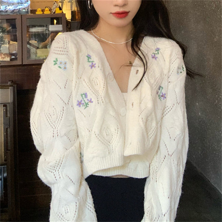 Ladies short knit vest with floral accents and openwork pattern Lune London