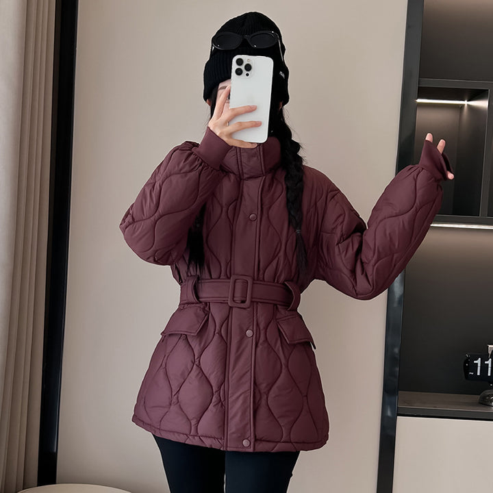 Fashion quilted jacket for women with a belted waist and practical pockets Lune London