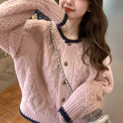 Ladies large knit cardigan with a unique weaving pattern and elegant buttons Lune London