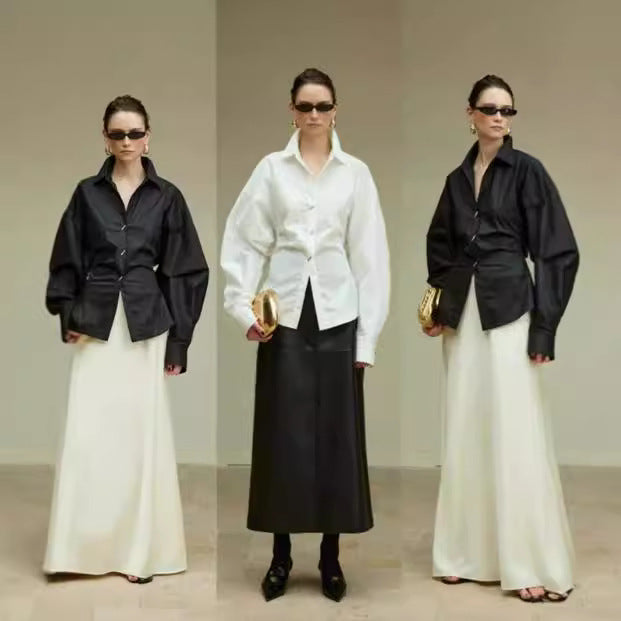 Blouse designer femme avec des manches volumineuses et des détails de boutons exquis Chic & Stil