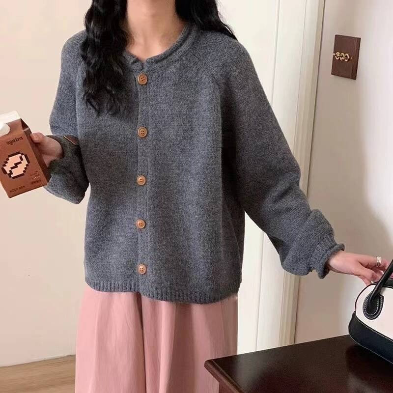 Knitted jacket for women with asymmetrical cut and generous balloon sleeves Lune London