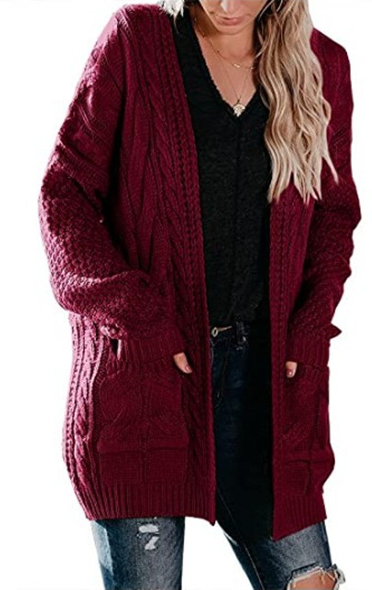 Lune London | Women's chunky knit cardigan with a feminine silhouette and practical pockets