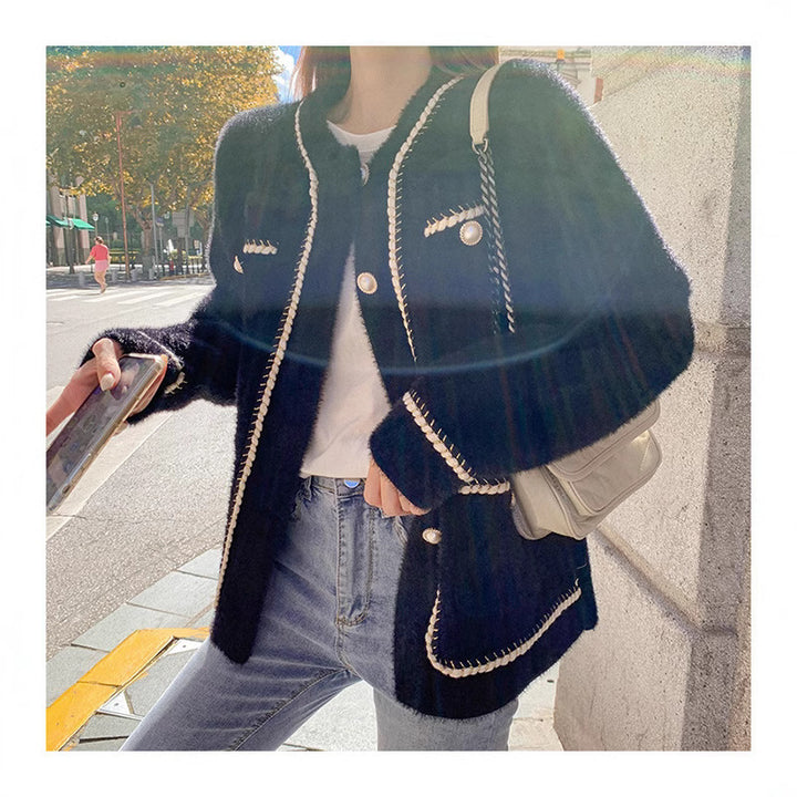Ladies fashionable cardigan with stylish contrasting seams and chic button details