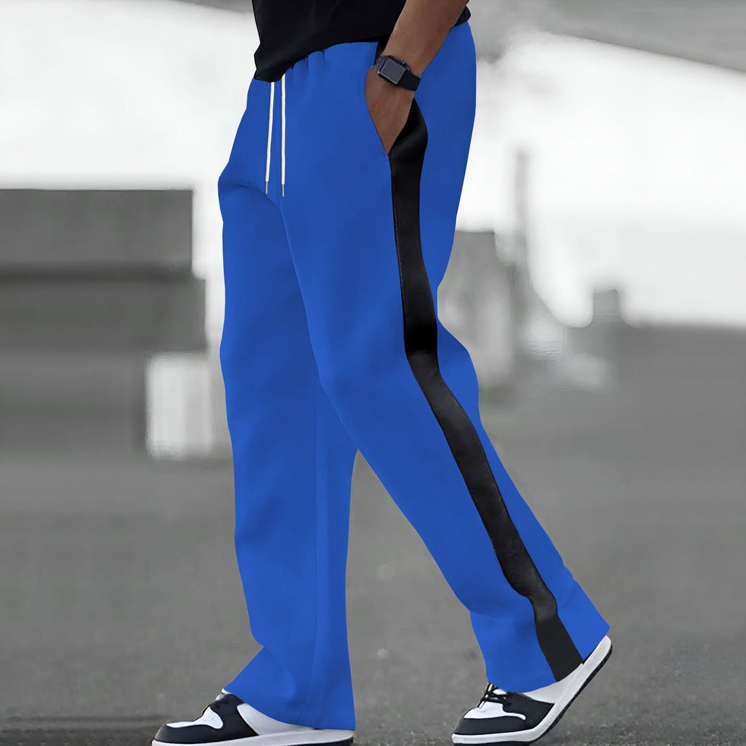 Trendy sports pants for men with elastic waistband and contrasting side stripes Lune London