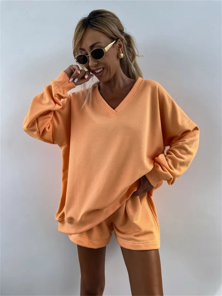 Casual outfit for women with oversized V-neck sweater and shorts Lune London