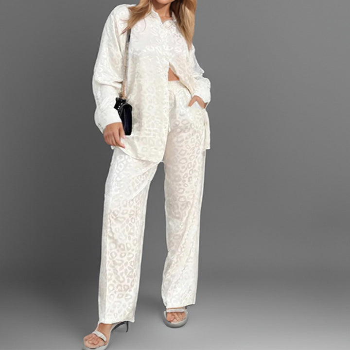 Pantalon élégant pour femmes avec fermeture à boutons sur le devant et jambes larges Chic & Stil