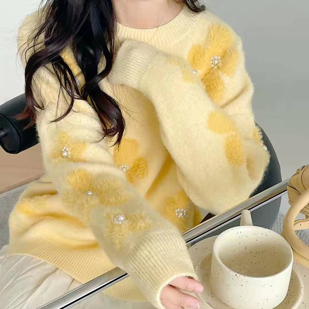 Cozy knitted sweater for women with pearl accents Lune London