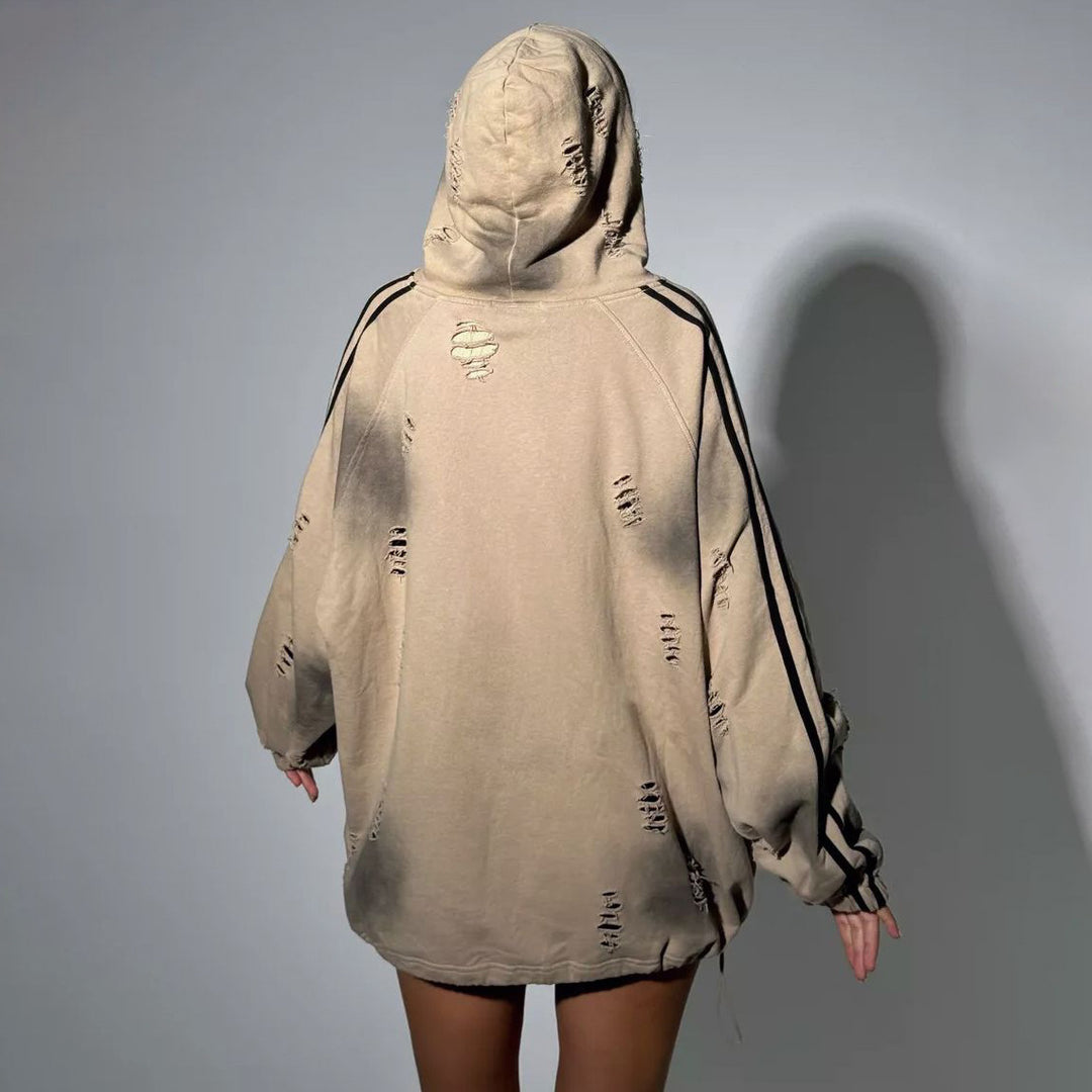 Oversized hoodie for women with trendy tear details and graphic print Lune London