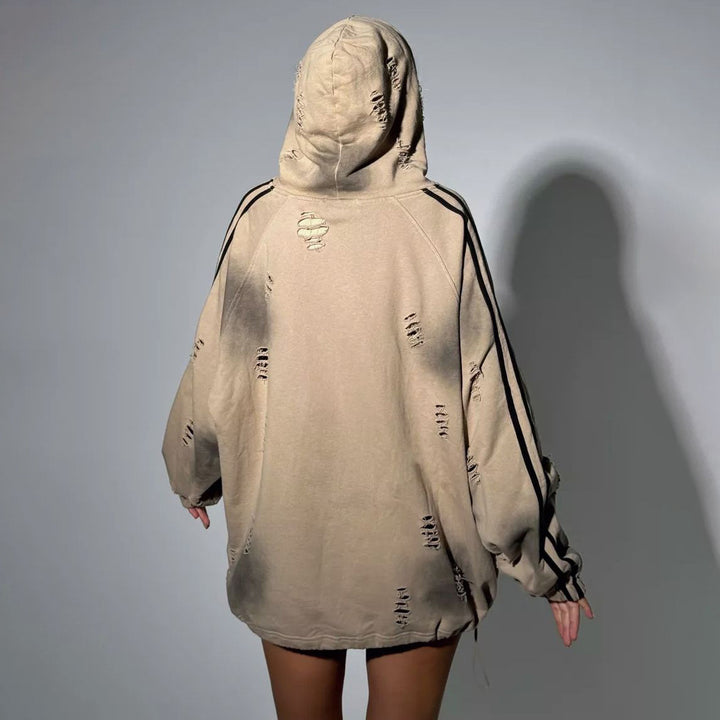 Oversized hoodie for women with trendy tear details and graphic print Lune London