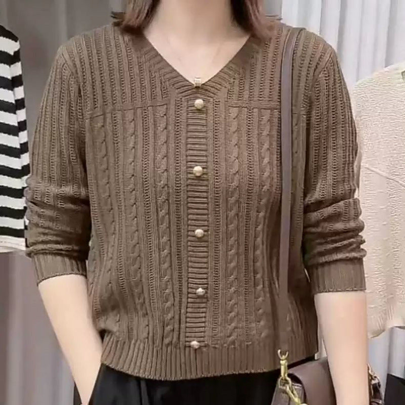 Women's knitted jacket with a delicate braid pattern and elegant pearl buttons Lune London