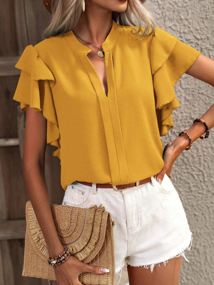 Women Elegant top with voluminous ruffled sleeves and V-neck Lune London