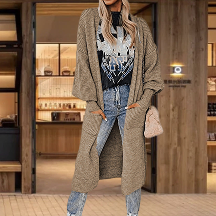 Knitted cardigan for women with wide sleeves and practical inset pockets Lune London