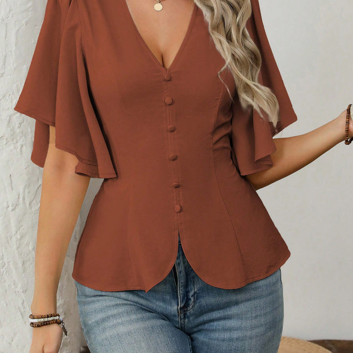 Women's elegant blouse with bell sleeves and button detail Lune London