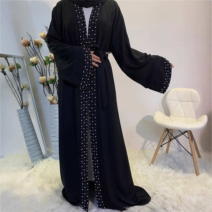 Elegant ladies Abaya with elaborate rhinestone details and a chic waist belt
