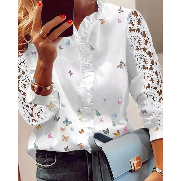 Women's blouse with floral appliqués, ruffle details, and lace sleeves Lune London