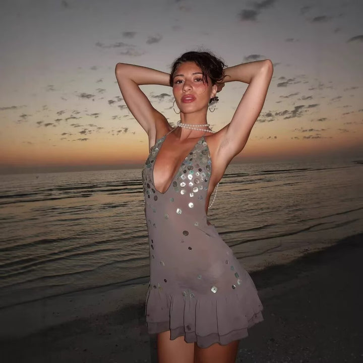 Summer dress for women with shimmering sequins and a voluminous hem Lune London