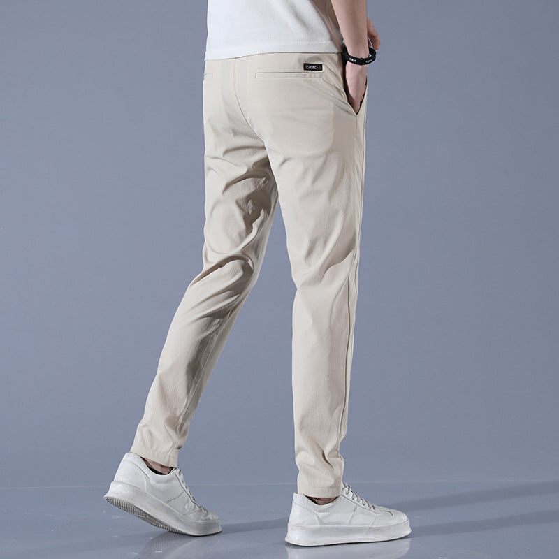 Sports jogger pants for men with elastic waist and practical zip pockets Lune London