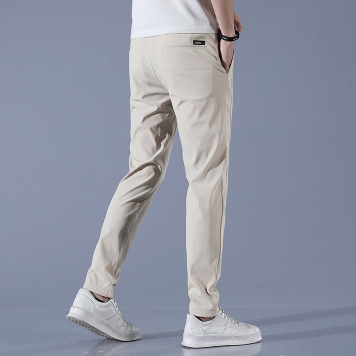 Sports jogger pants for men with elastic waist and practical zip pockets Lune London
