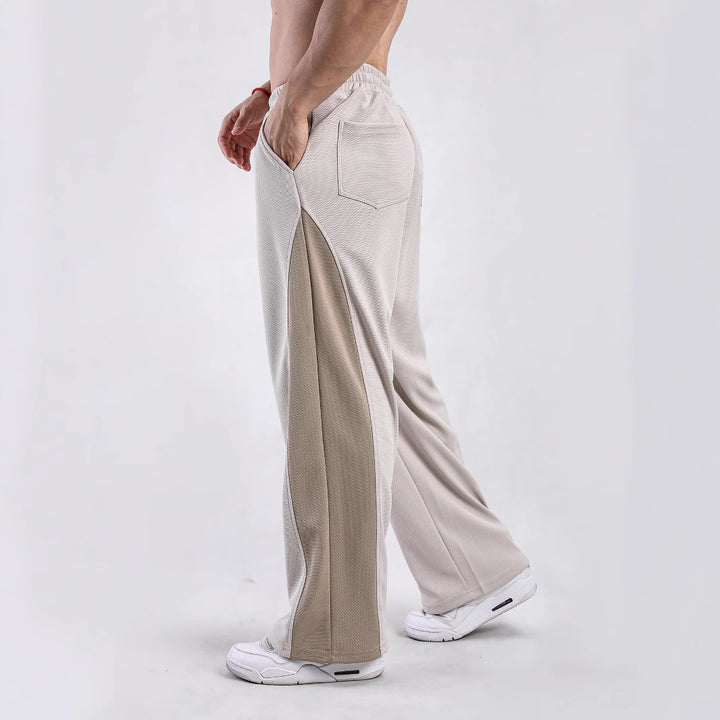 Men's sporty leisure pants with side ventilation openings and elastic waist Lune London