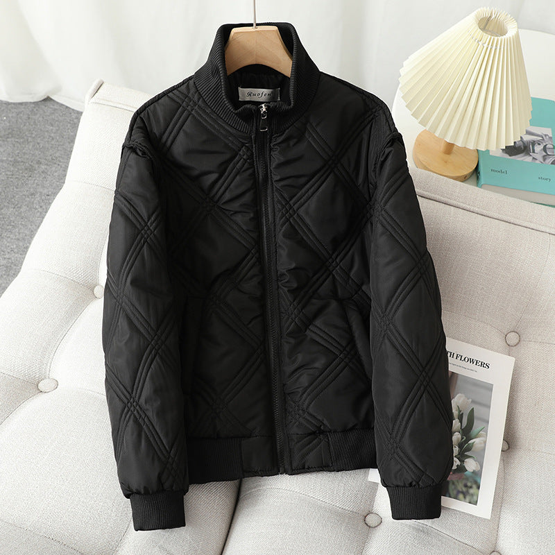 Ladies quilted transition jacket with high collar and elastic cuffs Lune London
