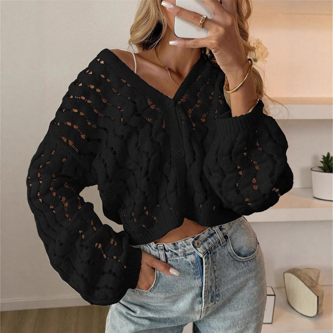 Women's knitted sweater with a unique hole pattern and a casual fit Lune London