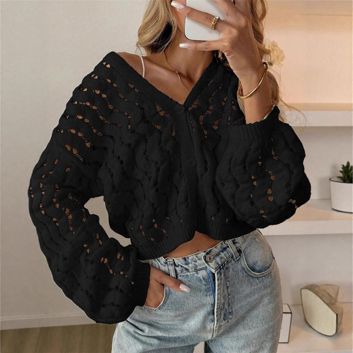 Women's knitted sweater with a unique hole pattern and a casual fit Lune London