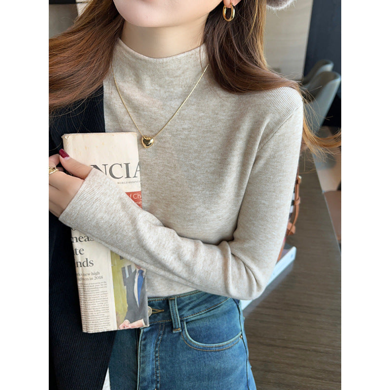 Pull-over tricoté pour femmes avec col montant et matériau doux Chic & Stil