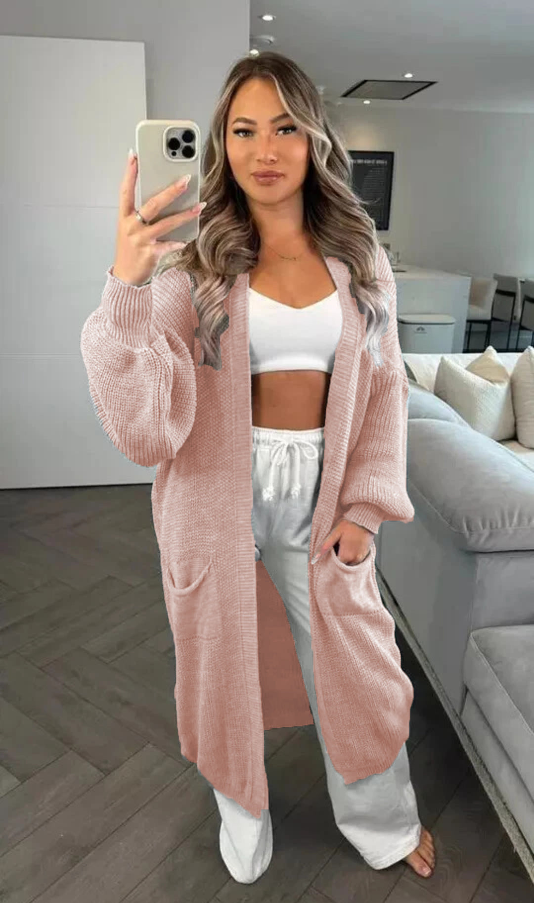 Chunky knit cardigan for women with a relaxed oversized style with practical pockets Lune Londonl