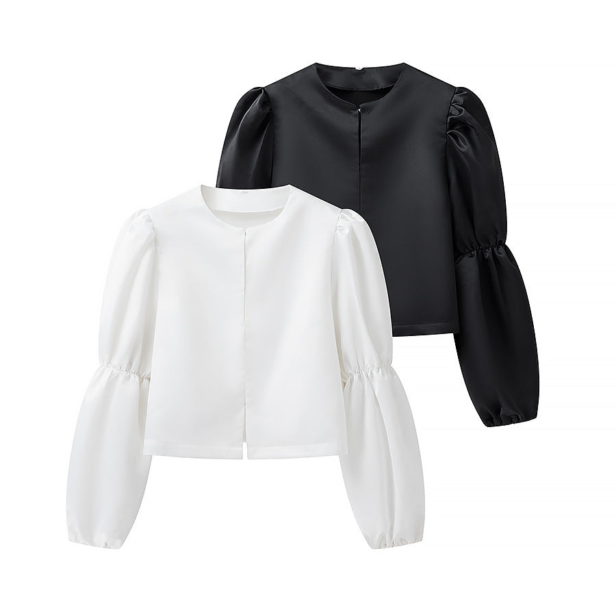 Women’s blouse with voluminous balloon sleeves and an elegant round neck Lune London