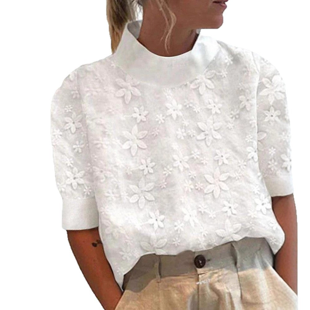 Blouse femme avec design de broderie florale et coupe courte Chic & Stil