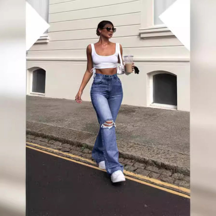 Ladies vintage flared jeans with stylish ripped details and high waistband Lune London