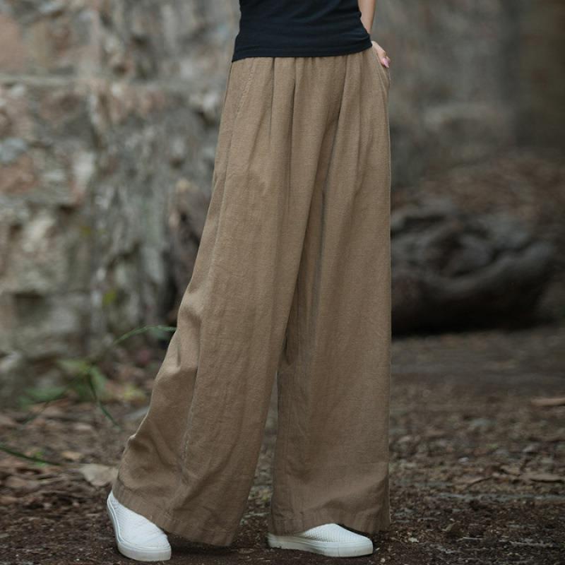 Linen trousers for women in loose fit with elastic waistband and practical pockets Lune London