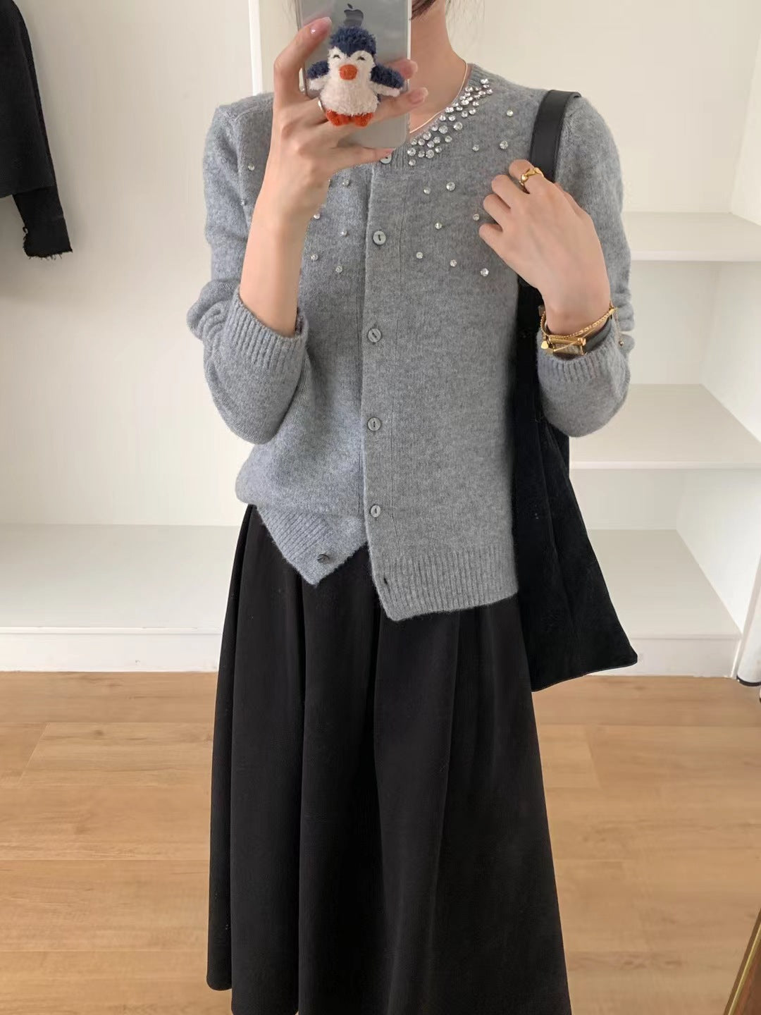 Knit jacket for women with elegant pearl appliqués and a classic round collar Lune London