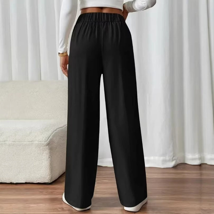 Pantalons élégants pour femmes taille haute avec des détails de boutons sur les côtés et une jambe large Chic & Stil