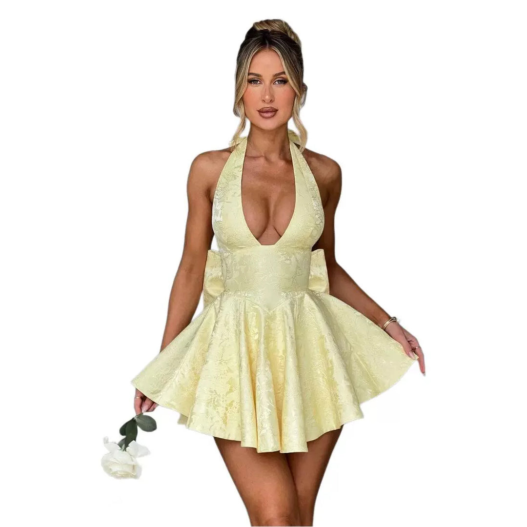 Women's skater dress with deep V-neckline and decorative bow elements