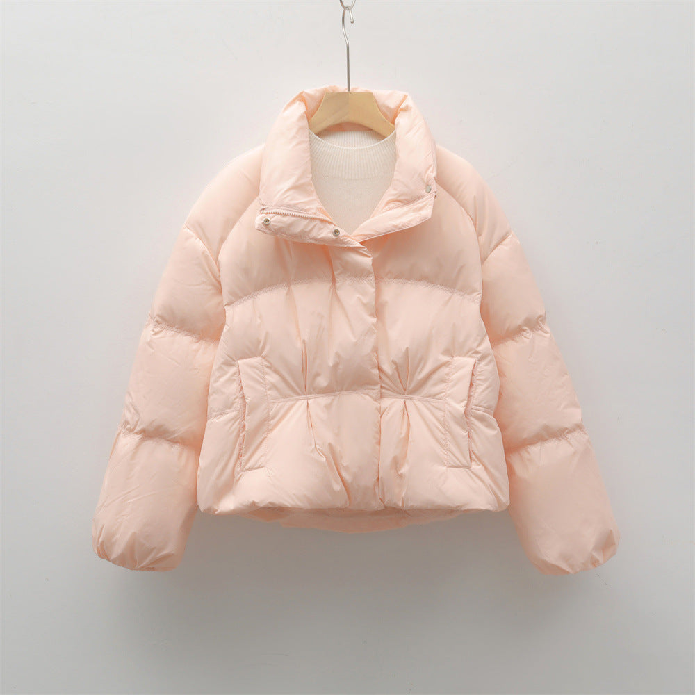 Short quilted jacket with high collar for women with practical pockets Lune London
