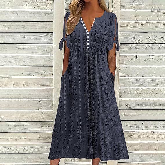 Airy midi dress for women with decorative hole patterns and practical pockets Lune London