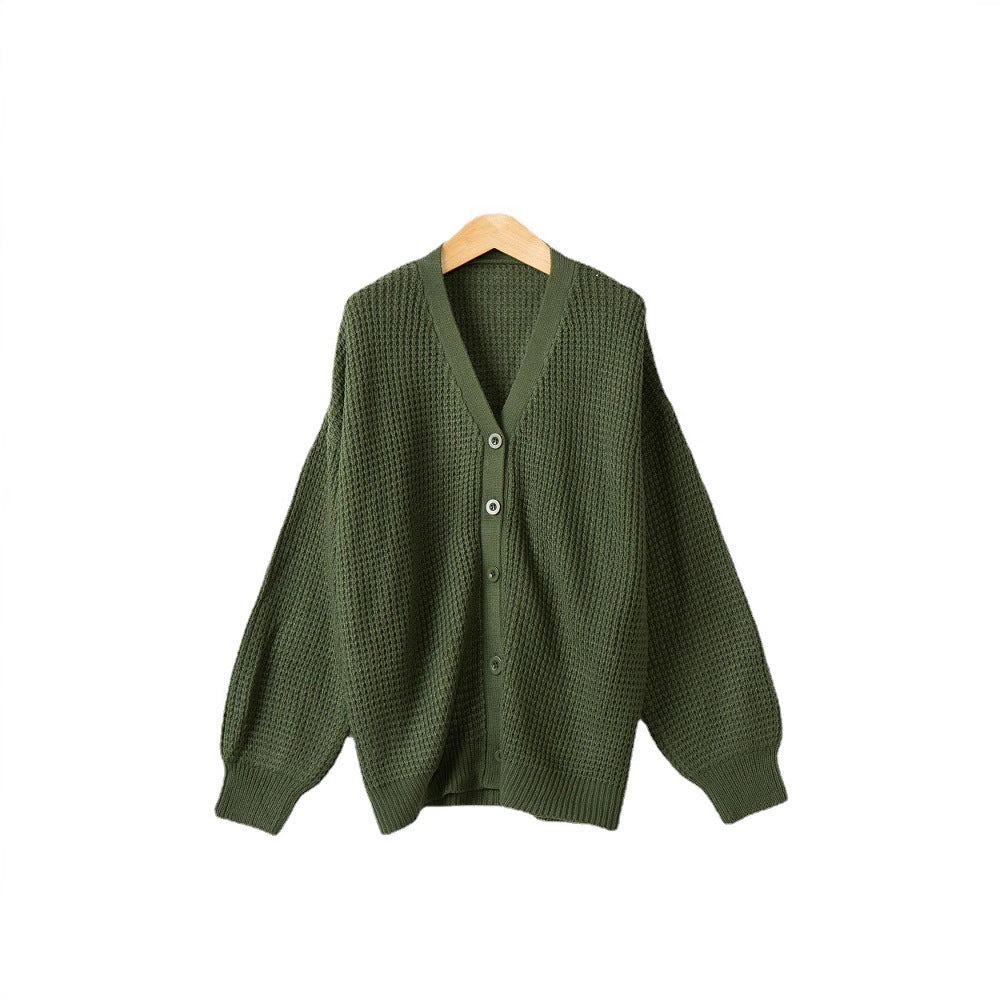 Women's knitted jacket with structured pattern and practical button details Lune London