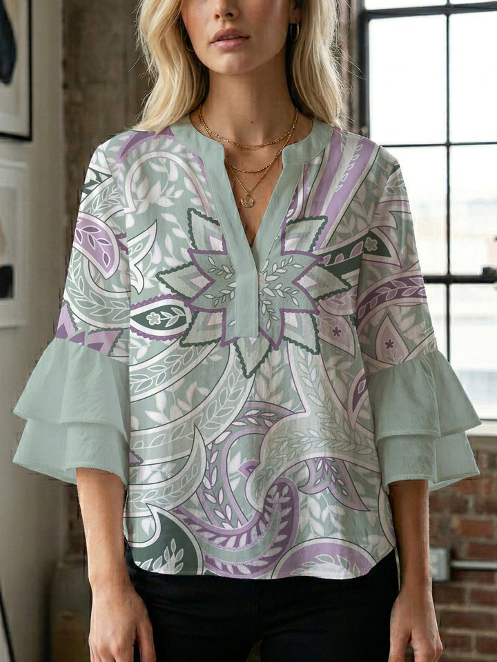 Women's blouse with voluminous ruffle sleeves and creative floral design Lune London