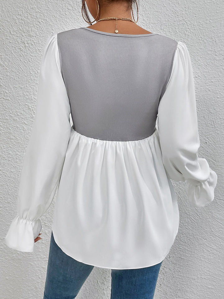 Ladies elegant top with asymmetrical V-neck and puff sleeves Lune London
