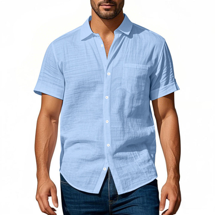 Short sleeve linen shirt for men with structured design and practical chest pocket Lune London