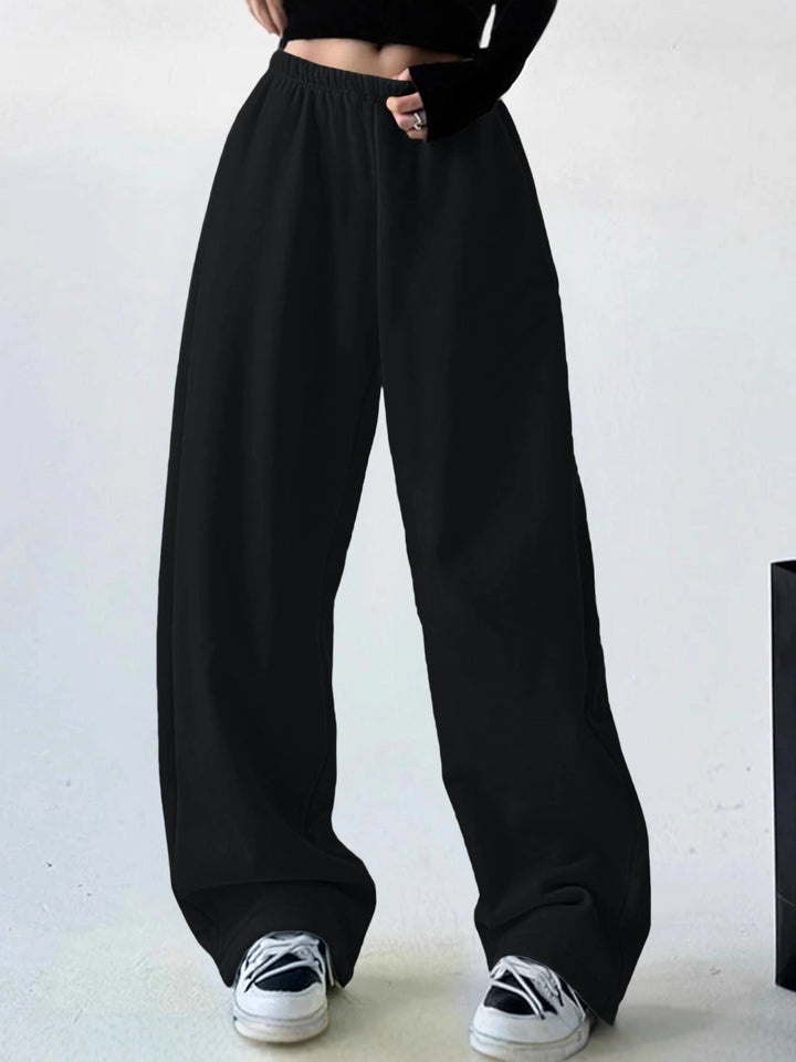 Loose leisure pants for women with elastic waistband and side pockets Lune London