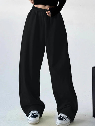 Loose leisure pants for women with elastic waistband and side pockets Lune London